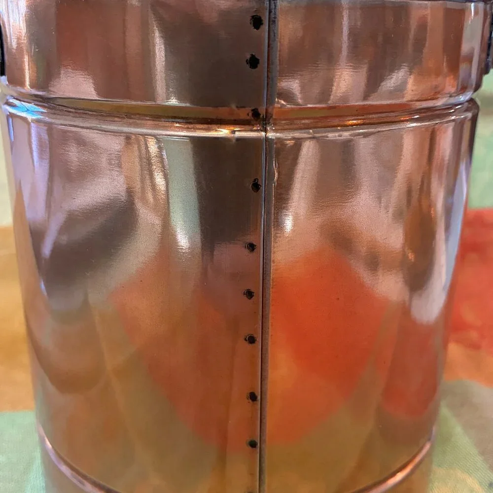 Treat bin with copper finish and photo slot